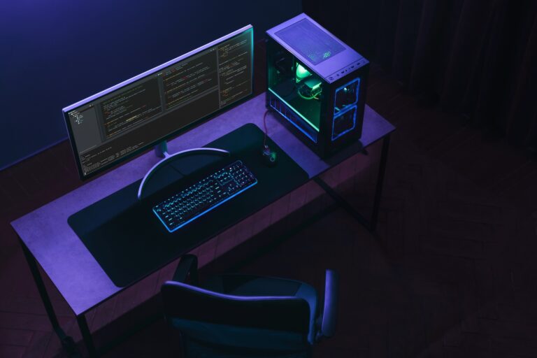 Top view of home coder workspace with professional programming setup