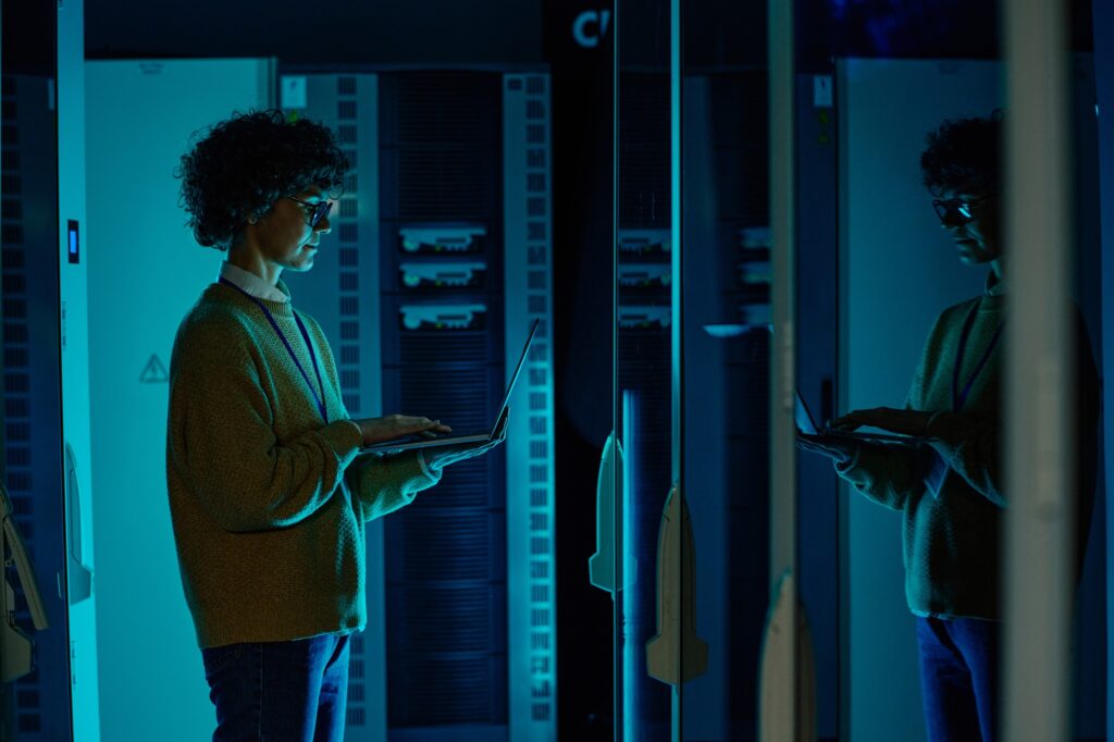 Engineer standing in data center
