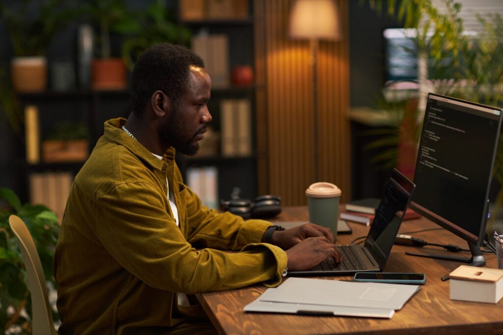 Man Developing Security Codes For Program