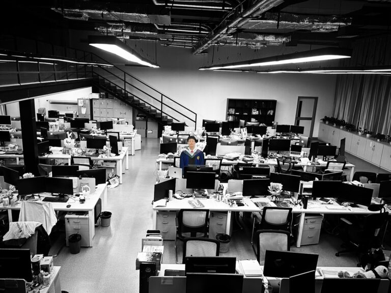 A room filled with lots of computers and desks
