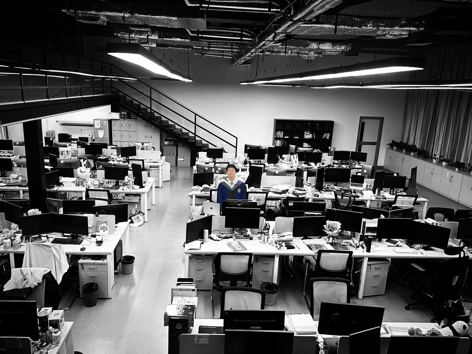 A room filled with lots of computers and desks